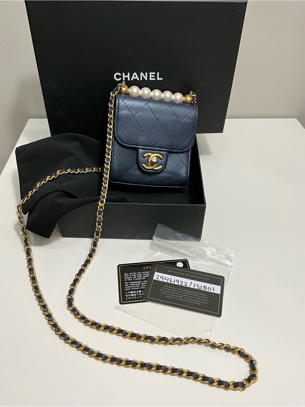 CHANEL Interlocking CC Chic Pearls Mini Flap Navy Blue Crossbody Bag